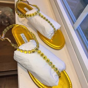 AQUAZZURA
Tequila crystal-embellished PVC and metallic leather sandals